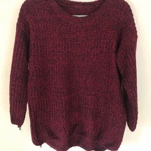 Knit sweater.